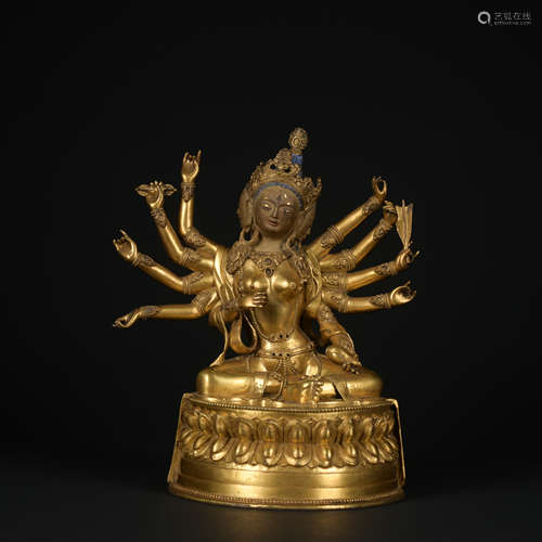 A gilt-bronze statue of Maha Cundi Bodhisattva