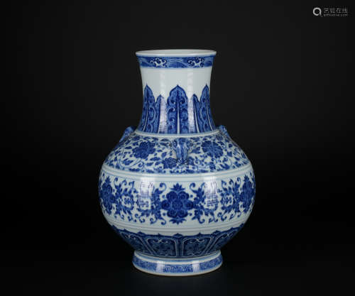 A blue and white vase with three ears