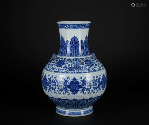 A blue and white vase with three ears