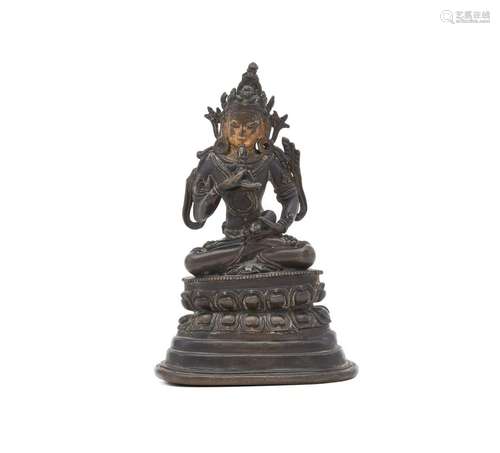 A Tibetan gilt bronze or copper figure of Vajrasattva