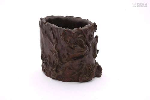 A Chinese carved aloeswood Magnolia brushpot