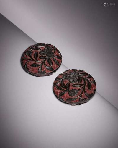 A rare pair of Chinese black and red lacquer boxes and cover...
