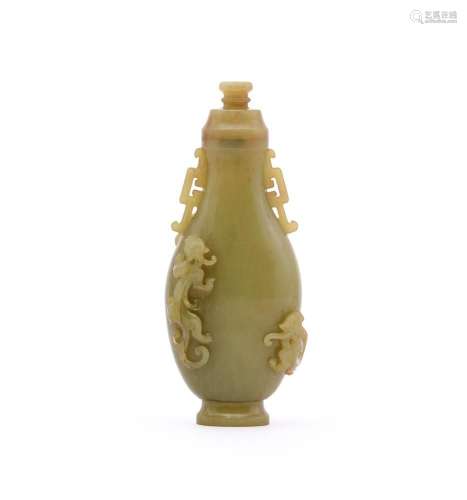 A Chinese celadon jade vase and cover