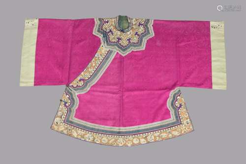 A fine Chinese magenta silk damask Chinese womens robe