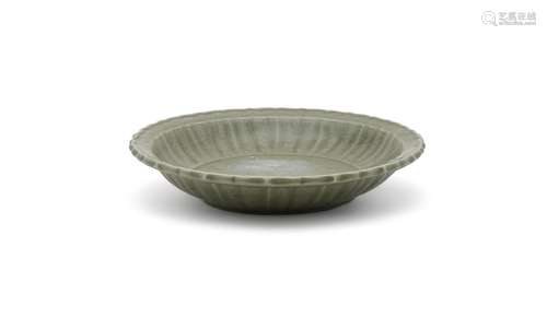 A large carved longquan celadon barbed dish