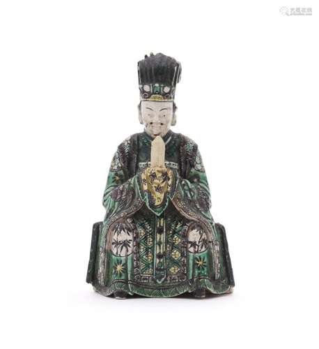 A Chinese Famille Verte figure of an Immortal