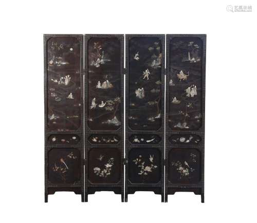 A CHINESE BLACK LACQUER EIGHTEEN LUOHAN FOUR-FOLD SCREEN