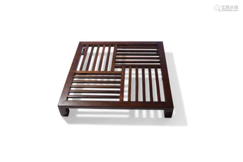 AN UNUSUAL CHINESE HARDWOOD SQUARE LATTICEWORK LOW STAND