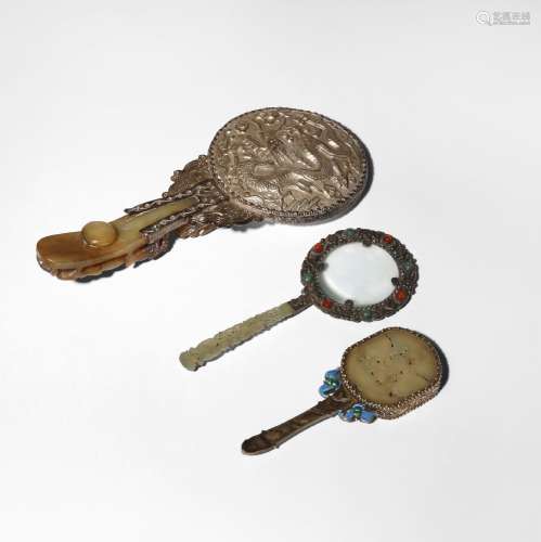 TWO CHINESE JADE AND SILVER MOUNTED MIRRORS AND A MAGNIFYING...