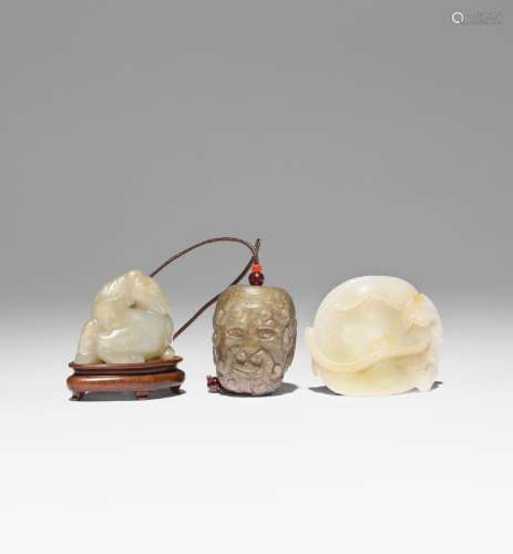 TWO CHINESE JADE CARVINGS AND A JADE HEAD PENDANT