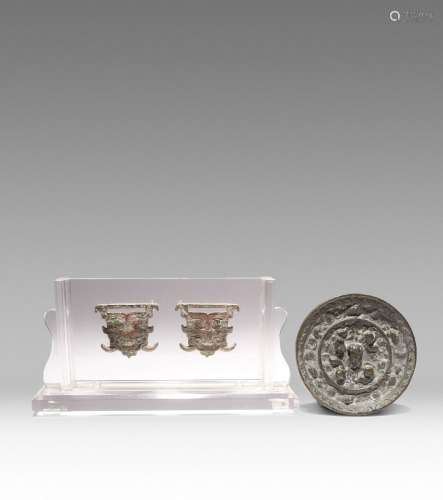 A PAIR OF SMALL CHINESE BRONZE MASK APPLIQUES AND A BRONZE M...