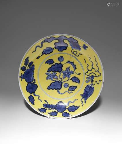 A CHINESE YELLOW-GROUND BLUE AND WHITE 'FRUITS AND FLOWERS' ...
