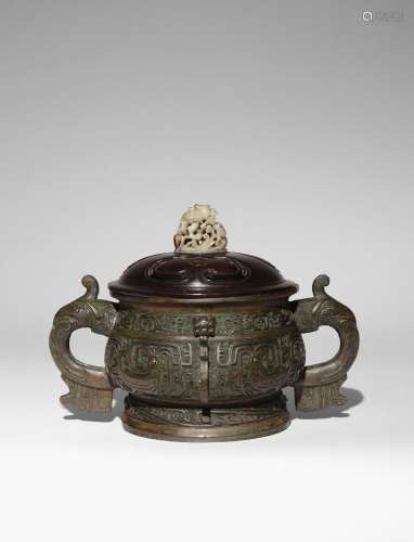 A LARGE CHINESE ARCHAISTIC BRONZE VESSEL AND COVER, GUI