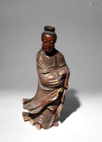 A CHINESE CARVED AND LACQUERED WOOD FIGURE OF GUANYIN