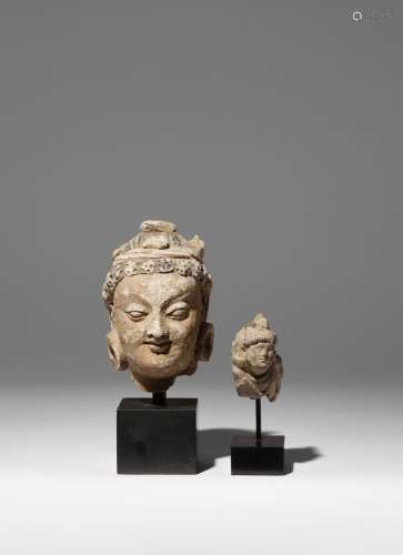 A GANDHARAN STUCCO HEAD AND A SMALL GREY SCHIST FRAGMENT