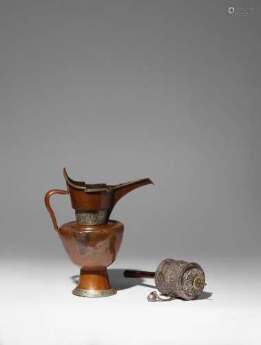 AN UNUSUAL CHINESE COPPER MONK'S CAP EWER AND A PRAYER WHEEL