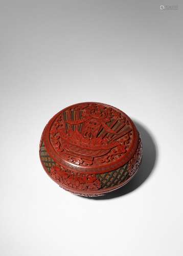 A CHINESE THREE-COLOUR CINNABAR LACQUER CIRCULAR BOX AND COV...