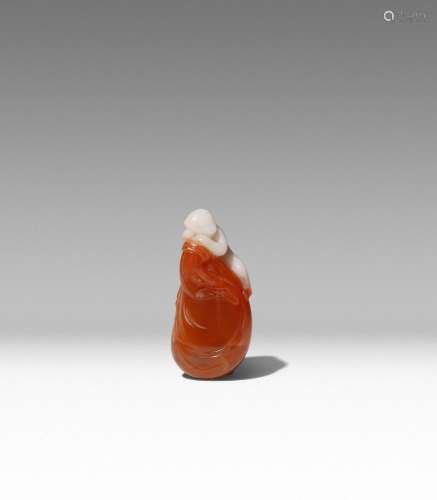 A SMALL CHINESE CARNELIAN CARVING