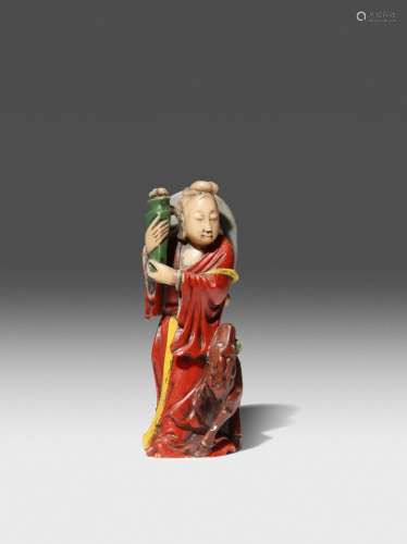 A CHINESE PAINTED SOAPSTONE FIGURE OF MAGU