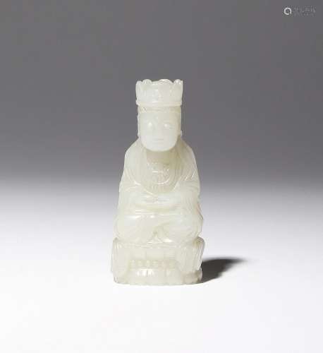 A CHINESE PALE CELADON JADE CARVING OF GUANYIN