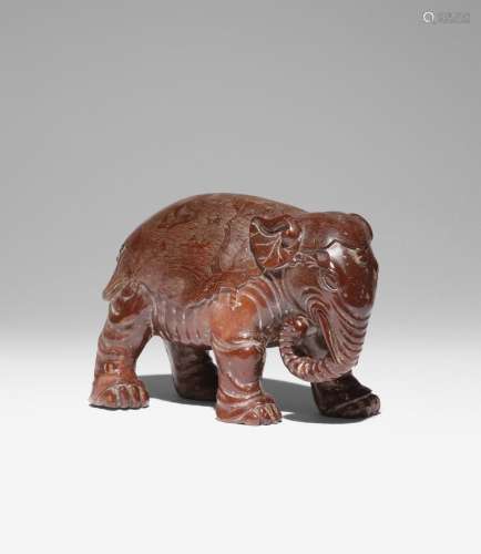 A CHINESE SOAPSTONE CARVING OF AN ELEPHANT