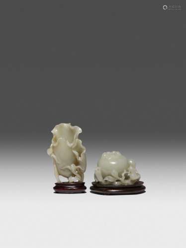 A SMALL CHINESE CELADON JADE VASE AND A JADE WATERPOT