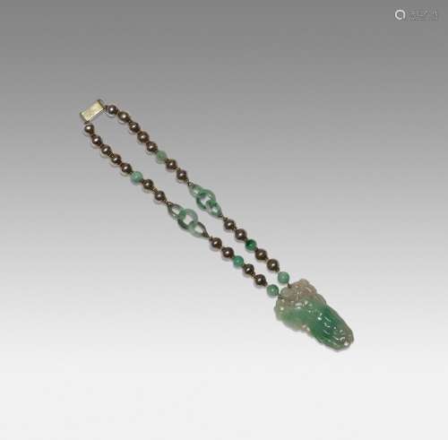 A CHINESE JADEITE AND BEAD NECKLACE
