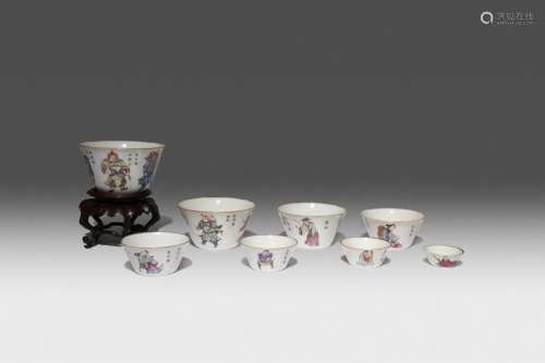A SET OF NINE CHINESE FAMILLE ROSE GRADUATED CUPS