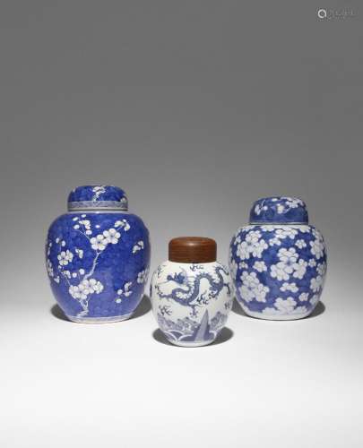 THREE CHINESE BLUE AND WHITE OVOID VASES AND COVERS