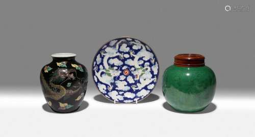 A CHINESE BLUE-GROUND DISH, A FAMILLE NOIRE JAR AND A GREEN ...