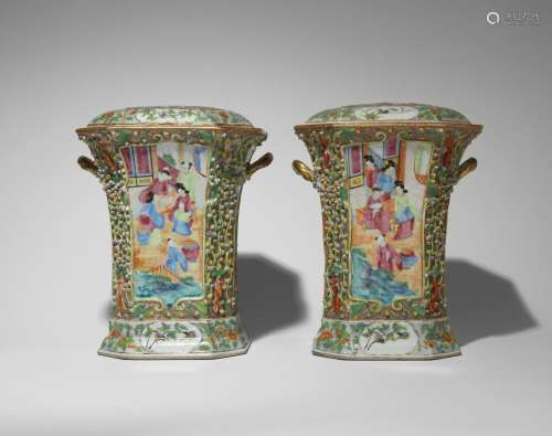 A PAIR OF CHINESE CANTON FAMILLE ROSE BOUGH POTS AND COVERS