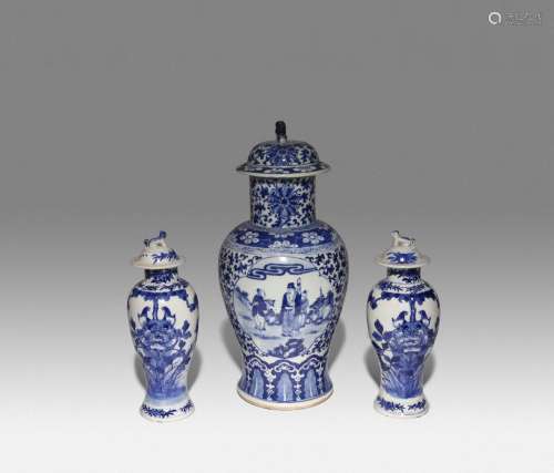 THREE CHINESE BLUE AND WHITE BALUSTER VASES AND COVERS