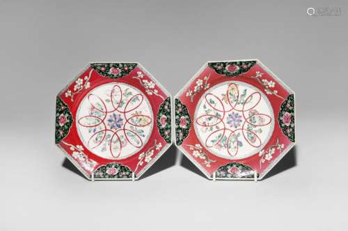 A PAIR OF CHINESE RUBY-GROUND FAMILLE ROSE OCTAGONAL DISHES