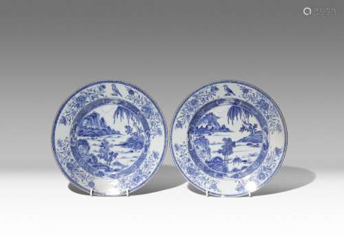 A PAIR OF CHINESE BLUE AND WHITE ARMORIAL PLATES