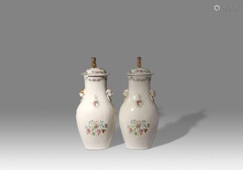 A PAIR OF LARGE CHINESE ARMORIAL BALUSTER VASES AND COVERS