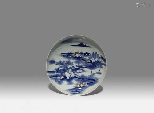 A LARGE CHINESE UNDERGLAZE BLUE AND RED 'LANDSCAPE' DISH