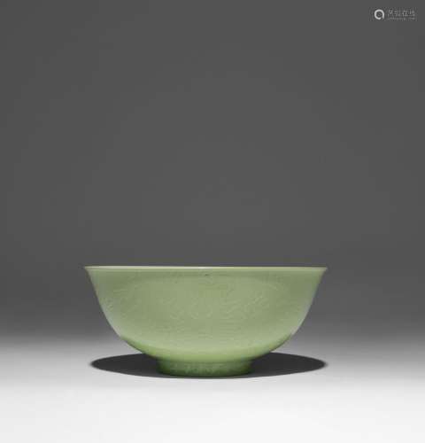A CHINESE LIME-GREEN GROUND 'DRAGON' BOWL