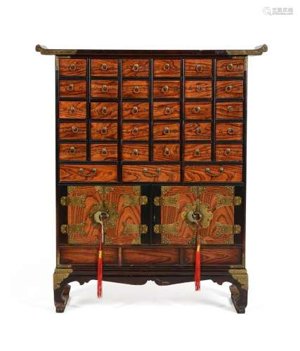 A Chinese wood medicine cabinet