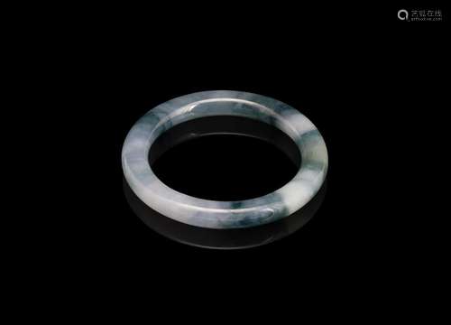 A Chinese jadeite bangle