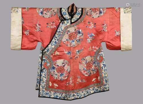 A Chinese coral red Chinese side fastening ladies three quar...