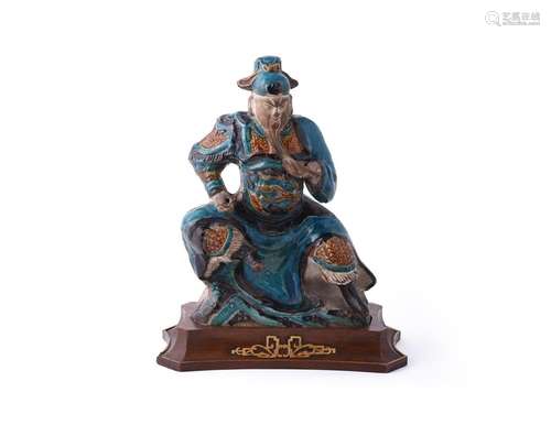 A Chinese pottery tile makers figure of Guandi