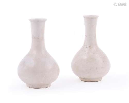 A pair of Chinese blanc de chine bottle vases