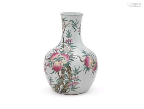 A Chinese famille rose nine peaches vase