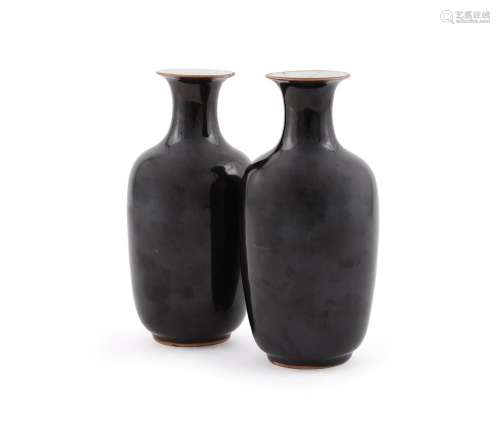 A pair of Chinese black glazed vases