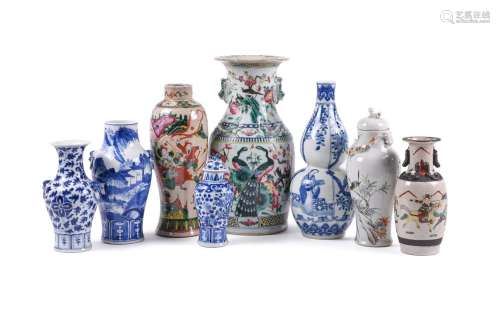 A group of Chinese blue and white and famille rose vases