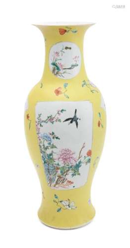 A Chinese yellow-ground famille rose sgraffito vase