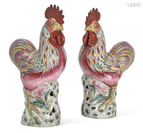 A pair of Chinese export porcelain famille rose figures of c...