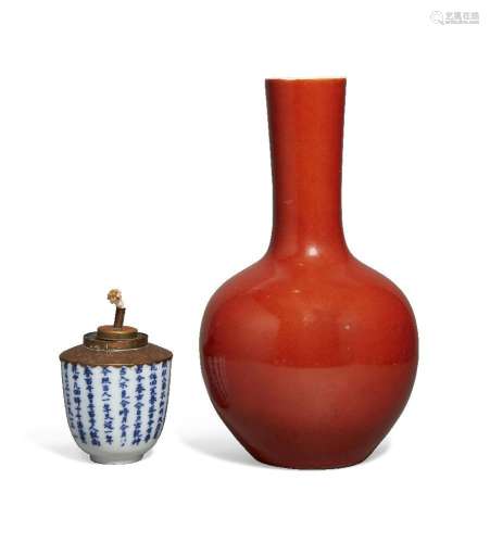 A Chinese porcelain coral-glazed bottle vase and a blue and ...