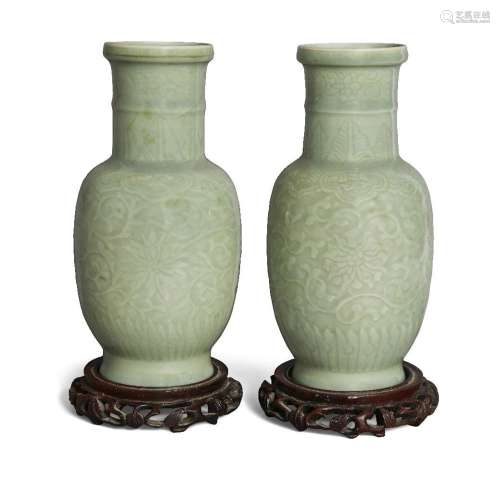 A pair of Chinese celadon-glazed carved 'lotus' vases