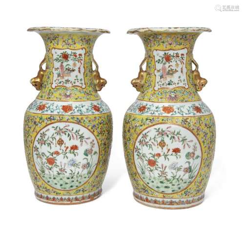 A pair of Chinese porcelain yellow-ground famille rose 'flow...